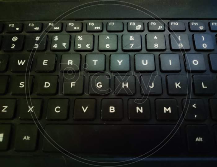 A Modern Equipment Keyboard With Button Of Laptop.