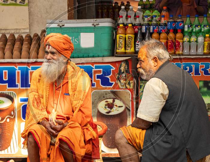 11 December 2019 Pushkar Rajesthan, India Sadhu (Saint) Is Sitting Out Side Shop