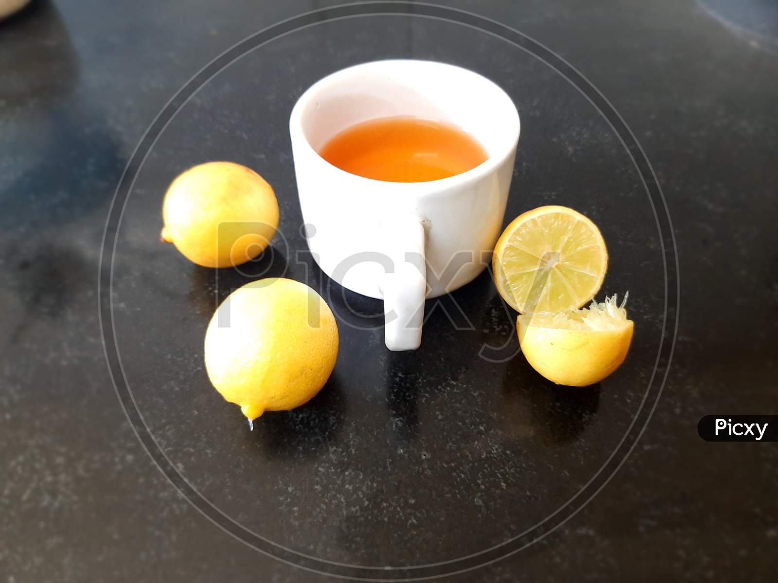 Cup of tea and lemon.