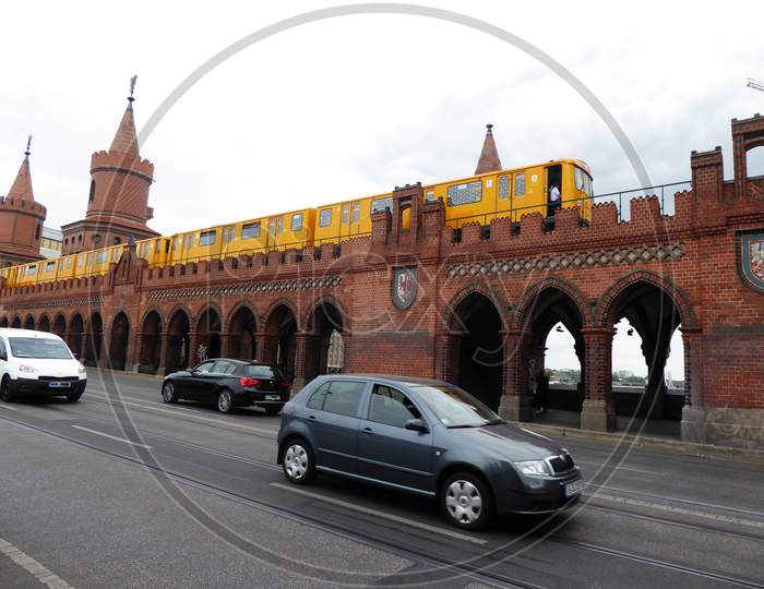 The Oberbaum Bridge Is A Double-Deck Bridge Crossing Berlin'S River Spree, Considered One Of The City'S Landmarks