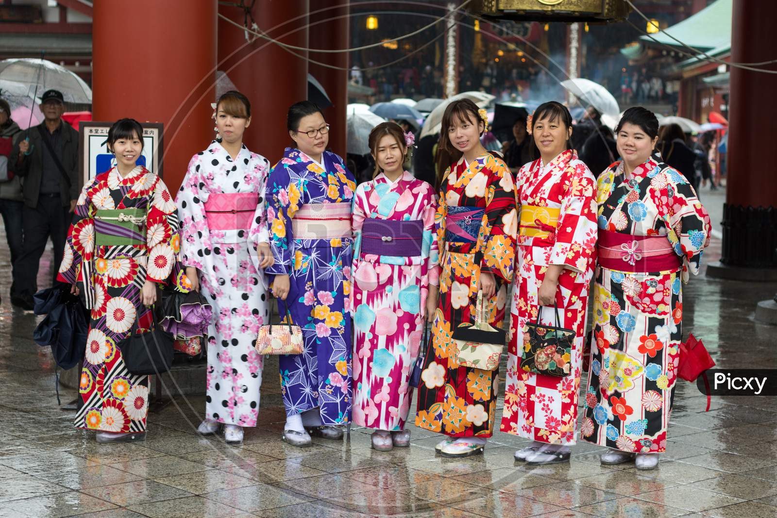 Girls Wearing Kimonos Outside Of The Sensoji Buddhist Temple In Asakusa, Tokyo
