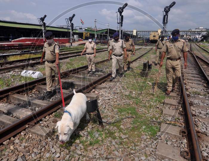 Railway Police Force (Rpf) Personnel Inspect The Tracks And Platform Along With A Sniffer Dog, Ahead Of The Independence Day Celebrations, In Guwahati On Monday, Aug 10, 2020.