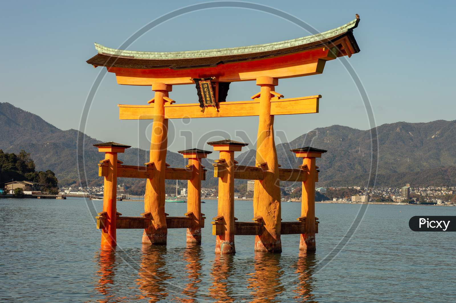 Itsukushima Shinto Shrine In Miyajima Island With Its Floating Torii Gate, Japan