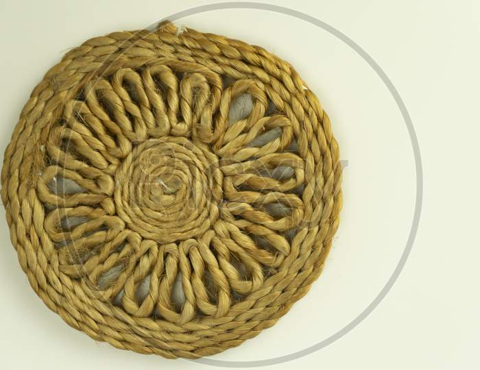 jute coaster kept one top of the other on isolated background