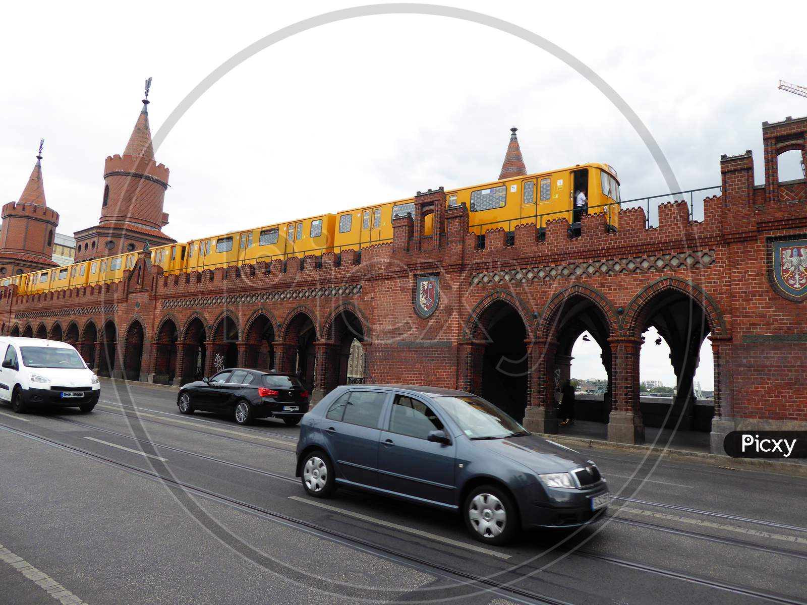 The Oberbaum Bridge Is A Double-Deck Bridge Crossing Berlin'S River Spree, Considered One Of The City'S Landmarks