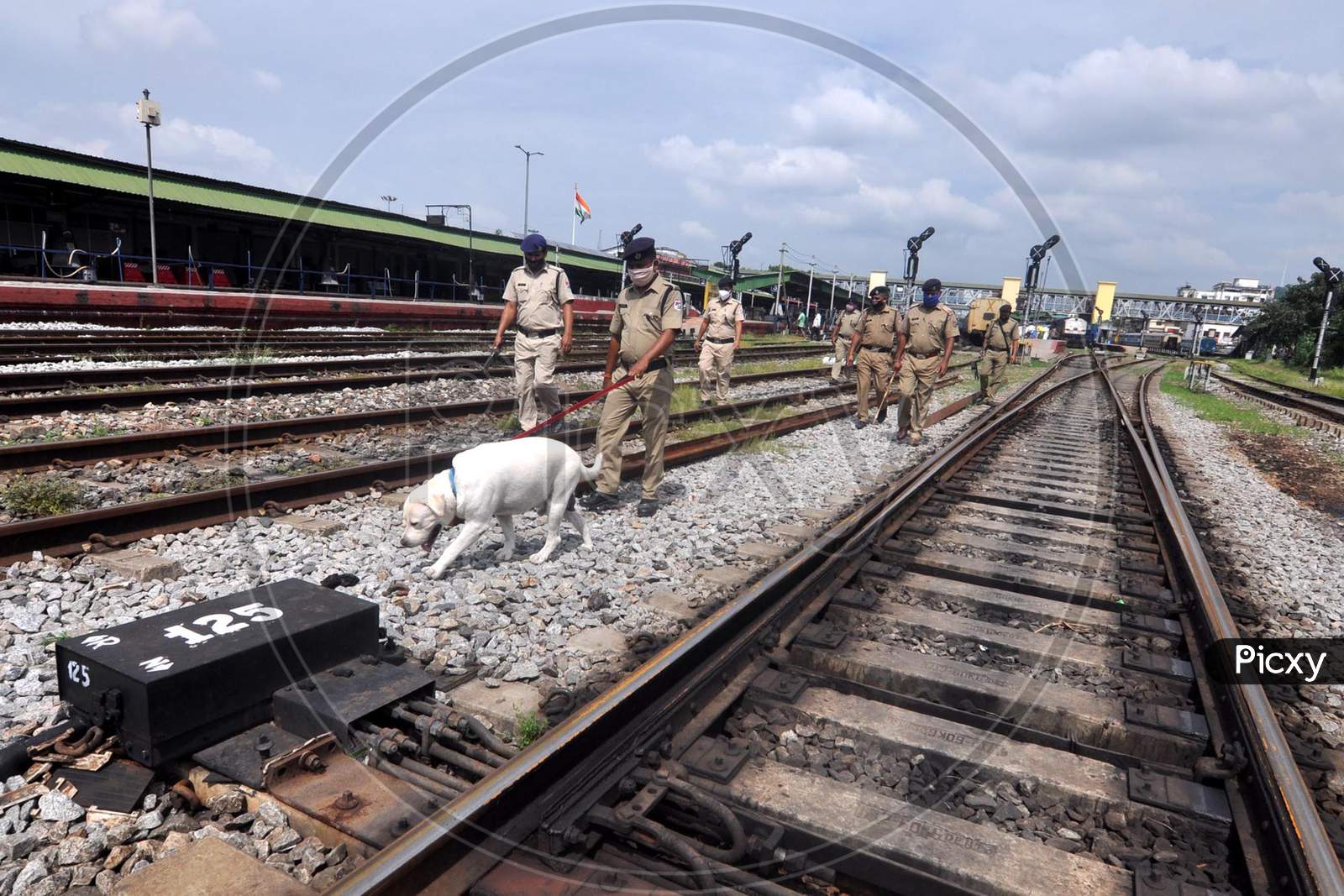 Railway Police Force (Rpf) Personnel Inspect The Tracks And Platform Along With A Sniffer Dog, Ahead Of The Independence Day Celebrations, In Guwahati On Monday, Aug 10, 2020