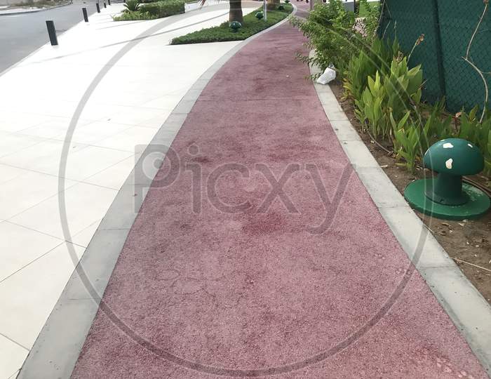 One Meter Wide Rubber Flooring For Walking Jogging And Running At An Outdoor Park Physical Activity