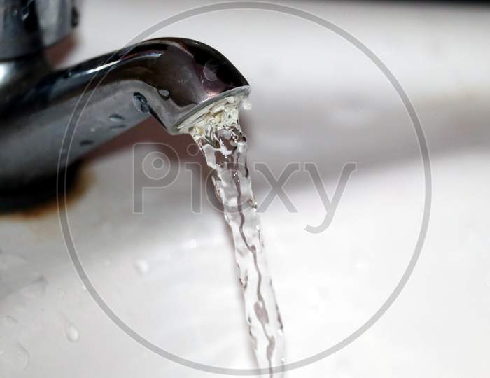 Tap Water Flow In Washbasin
