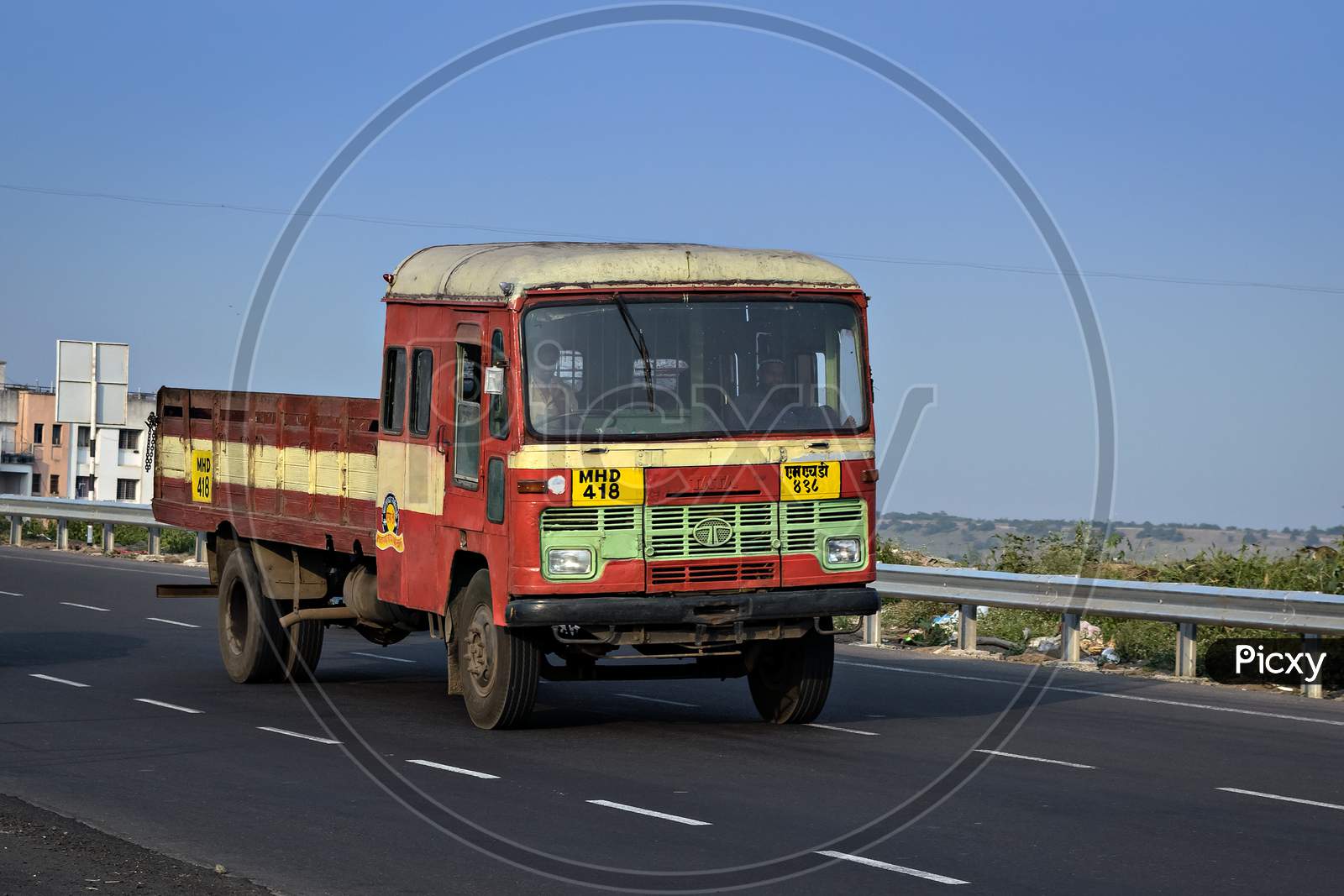 Pune, Maharashtra, India- October 25Th, 2016: State Transport Open Truck Speeding On Highway.