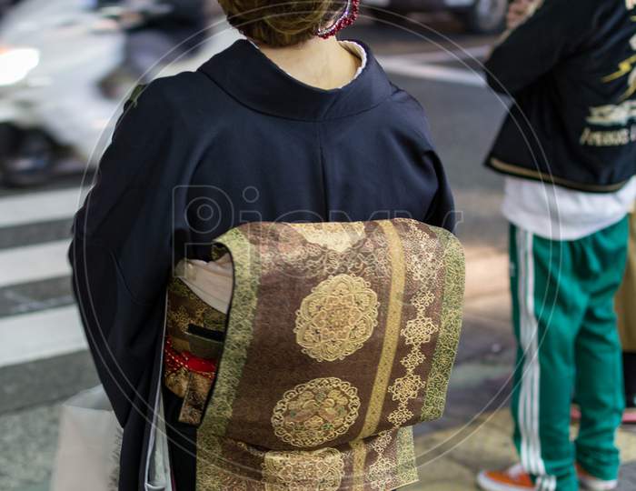 Woman Wearing Traditional Kimono In Streets Of Kobe, Hyogo Prefecture, Japan