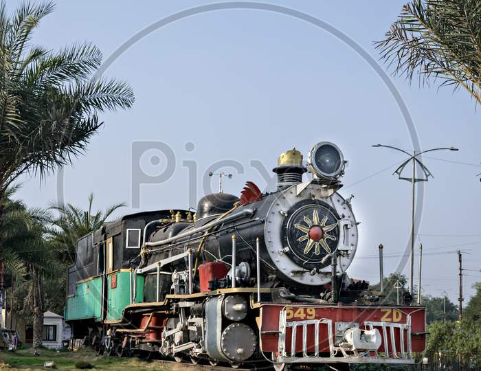 Solapur,Maharashtra,India-December 23Rd,2019: Old Narrow Gauge Steam Locomotive, Zd-549 Preserved By Displaying In Front Of Solapur Railway Station.