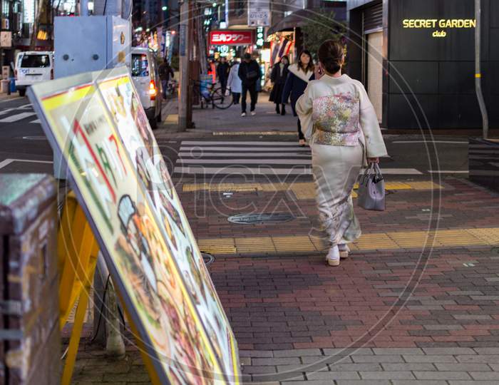 Woman Wearing Traditional Kimono In Streets Of Kobe, Hyogo Prefecture, Japan