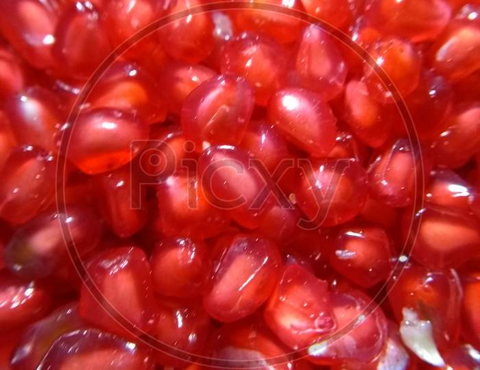 Red colour fruit called pomegranate