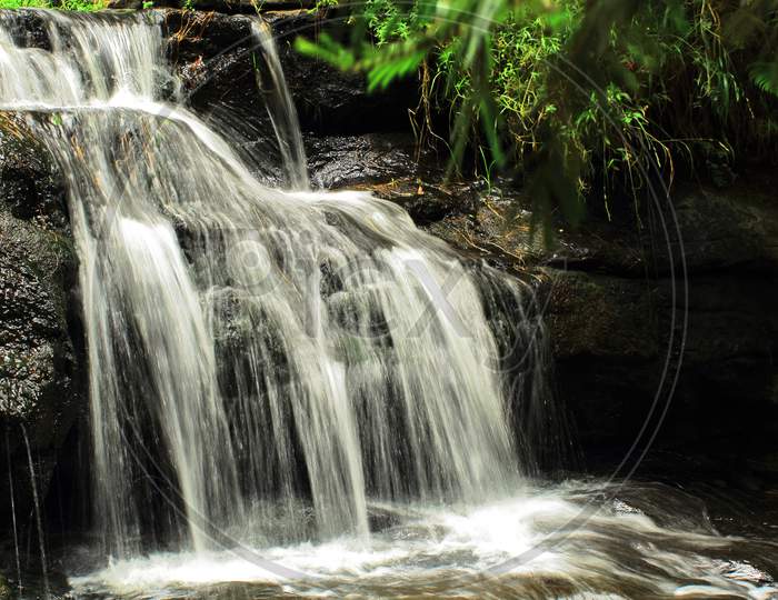 vattakanal waterfalls on levinge stream, located in a rain forest on the slope of palani mountain range at kodaikanal, tamilnadu, south india
