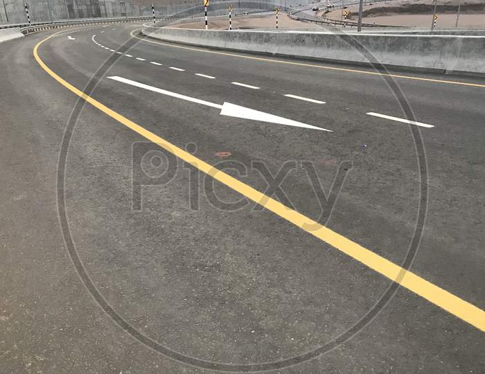 Image Of Tarmac Road Constructed In National Highways With International Standard Marks And Symbols For Both Sides Transport