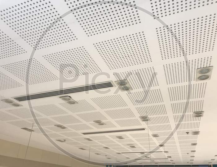 Perforated Metallic Grid Ceiling Design View Or Metallic False Ceiling Images Of An Office Building Roof Decoration
