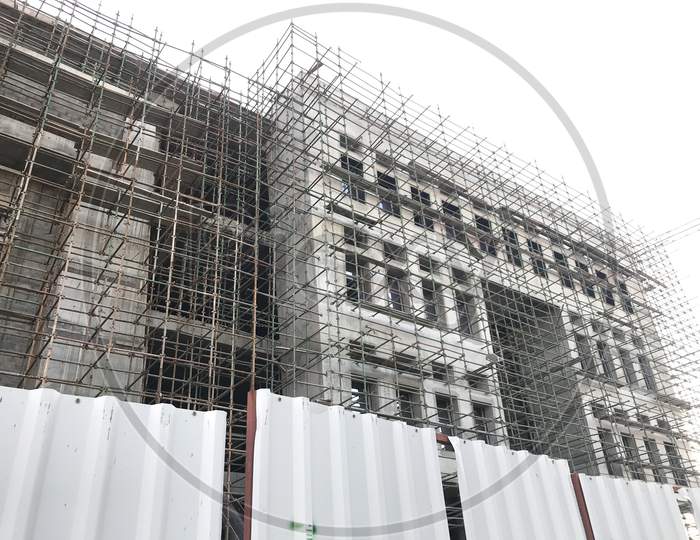 Ongoing Progressive Construction Site With Scaffolding And Shuttering