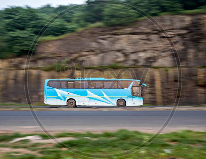 Pan Image With Blur Background Of Of A Speeding Msrtc Ac Scania Bus , Speeding Towards Mumbai.