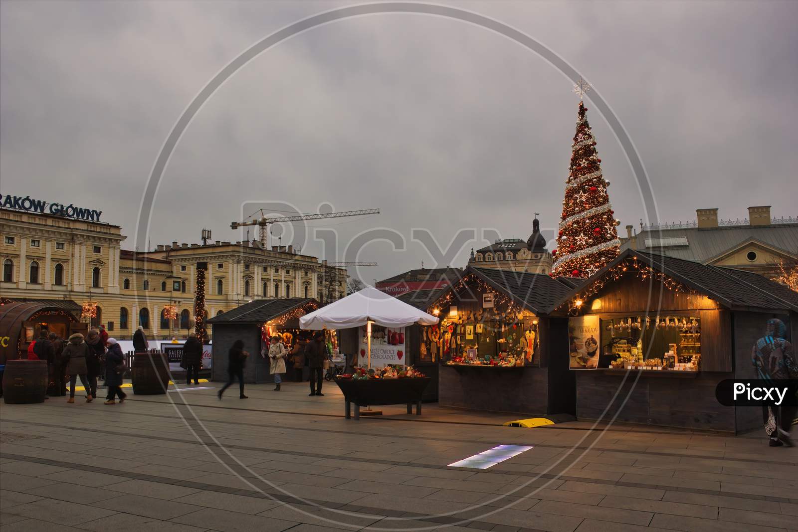 Krakow, Poland - November 30, 2014: A View Of Gift And Souvenir Shops Before Christmas Tree