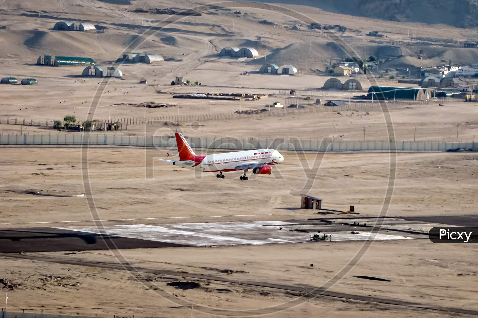 Leh, Jammu And Kashmir, India - June 26, 2011 : Air India Airbus Touches Down At Leh Airport