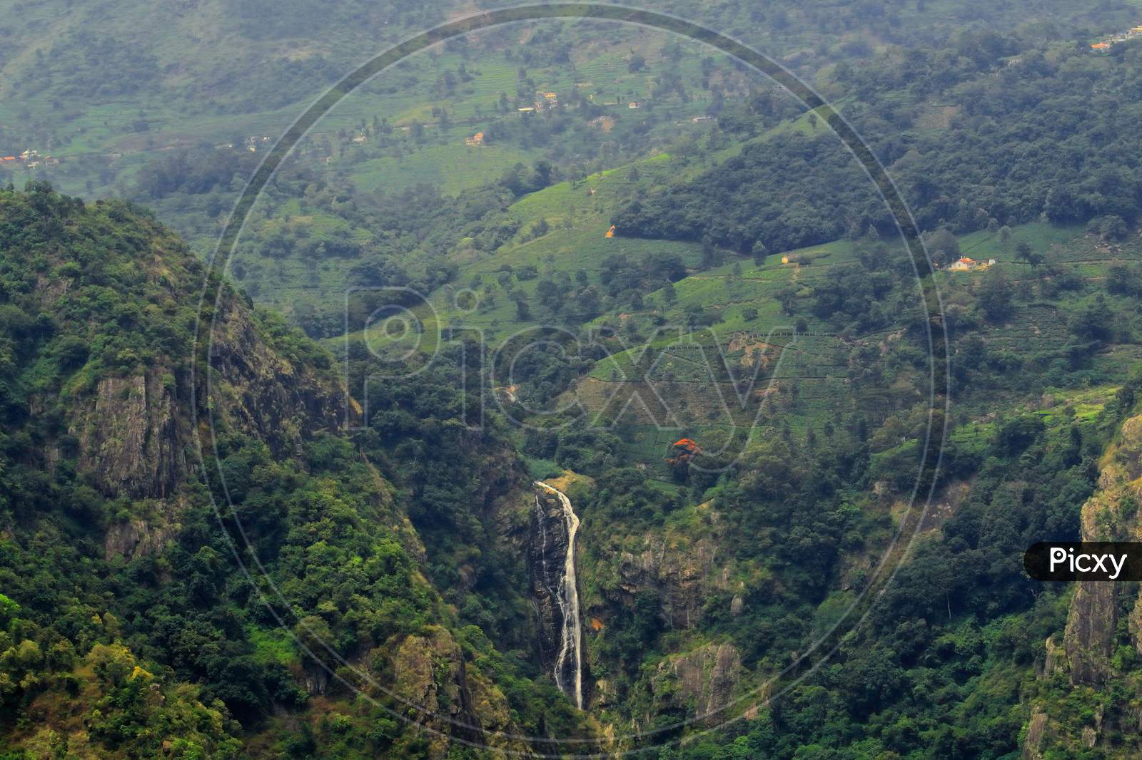 panoramic view of catherine waterfalls from dolphin nose view point at coonoor, near famous ooty hill station. coonoor located at the nilgiri foothills in tamilnadu, south india