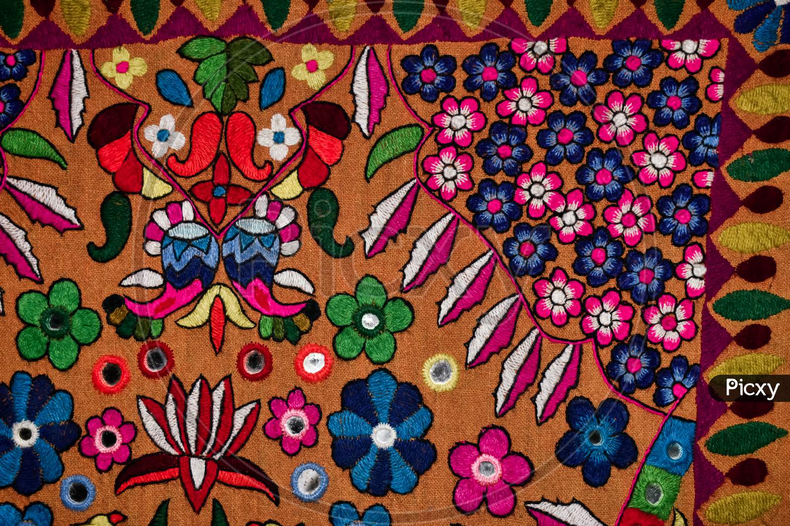 Background Colorful Image Of Hand Made Flower Design.
