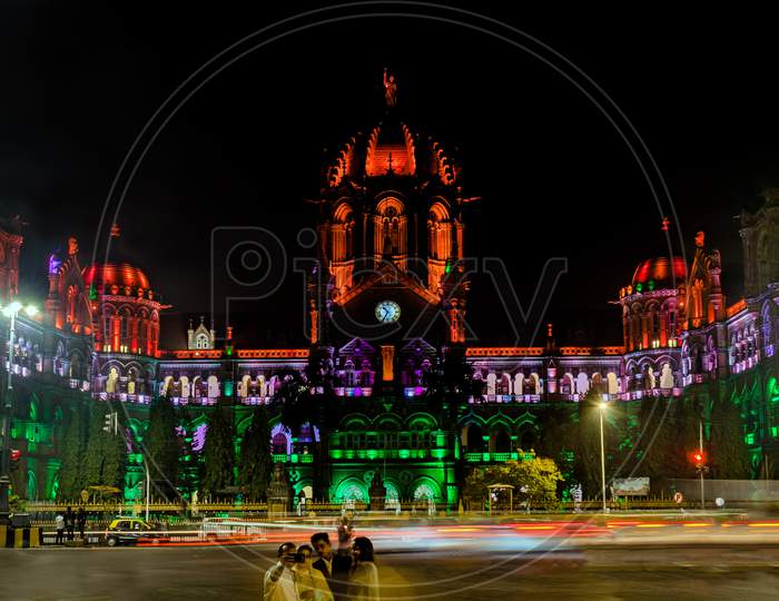 A Family Takes Selfie Against Unesco Heritage Building Of `Chatrapati Shivaji Maharaj Terminus` Railway Station Specially Lighted Like Indian Flag .