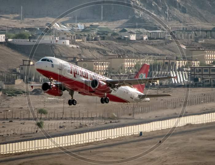 Leh, Jammu And Kashmir, India - June 26, 2011 : Kingfisher Airlines Airbus A-320 # Vt-Dkr Takes Off From Leh