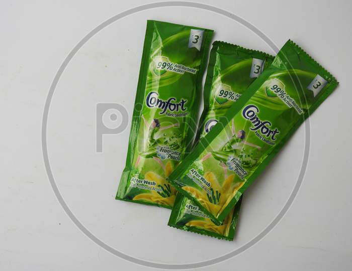 Image of Closeup of Comfort Fabric Conditioner Anti Bacterial Green Rs. 3  Sachet or Pack isolated on white background-VC829579-Picxy