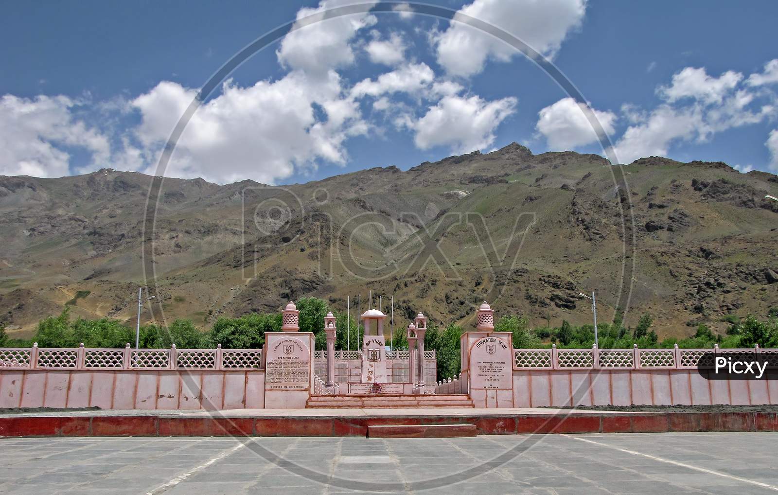 Kargil, Jammu And Kashmir-June 27Th, 2011: Memorial Built On The Occassion Of India'S Win In Kargil War. Also Known As Operation Vijay Memorial On The Background Of Tololing Hills And Nice Sky.