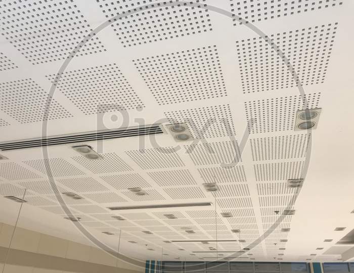 Perforated Metallic Grid Ceiling Design View Or Metallic False Ceiling Images Of An Office Building Roof Decoration