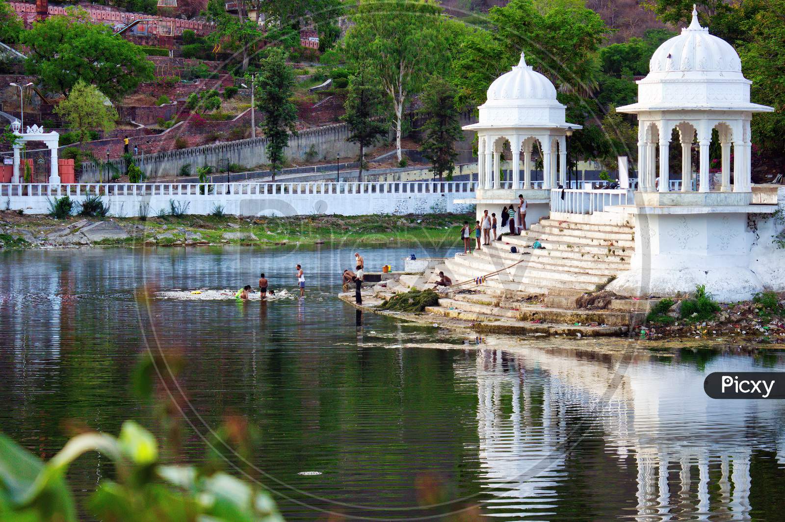 Udaipur, India - May 22, 2013: People By The Lake Located In Doodh Talai Musical Garden In Rajasthan State