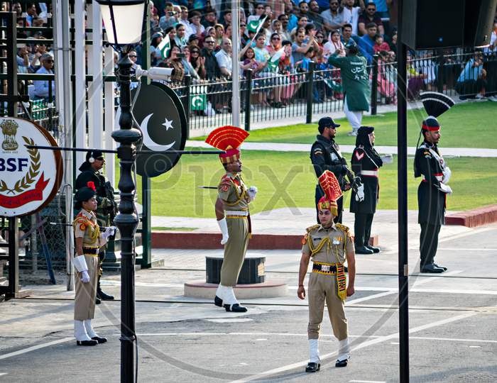 Amritsar,Punjab,India-April 14Th, 2019:Border Security Force Personnel Of India And Pakistan Marching In Beating Retreat Ceremony At The India-Pakistan Wagah Border.