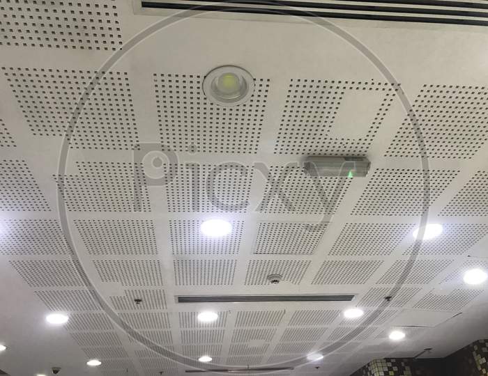 Perforated Gypsum Grid Ceiling Design View Images Of An Commercial Shopping Mall Or Office Building Ceiling Architecture Interiors