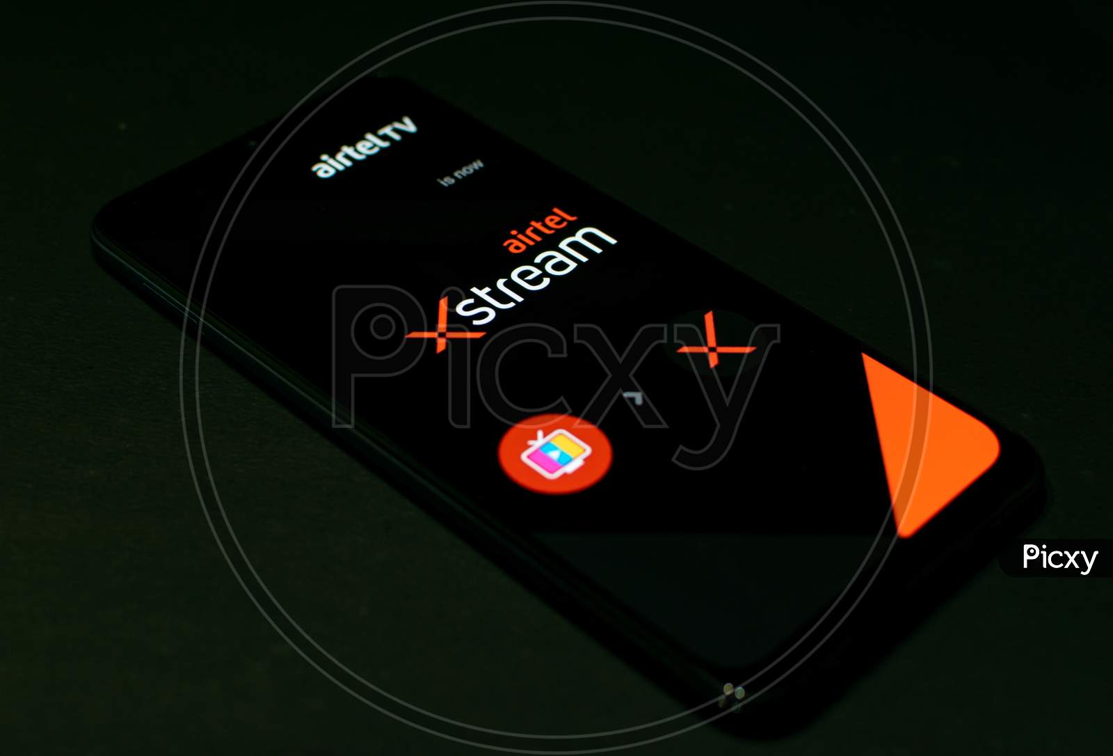 Airtel Xstream application on Smartphone screen. This app is a freeware in Android Playstore developed by Airtel