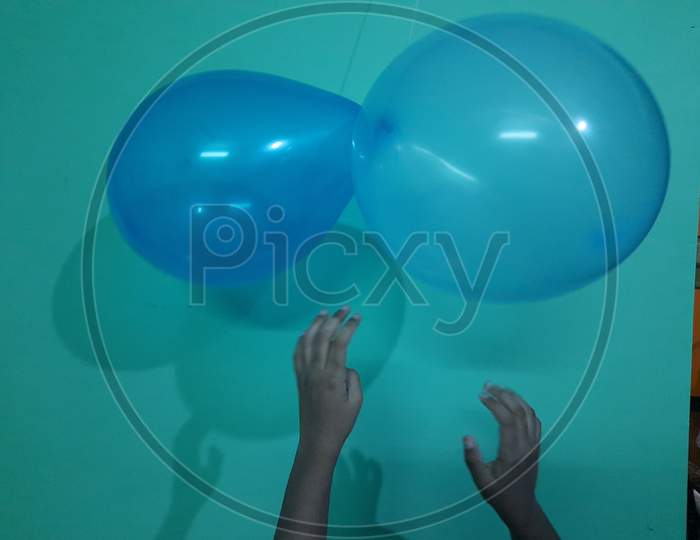 Children Playing with balloons image