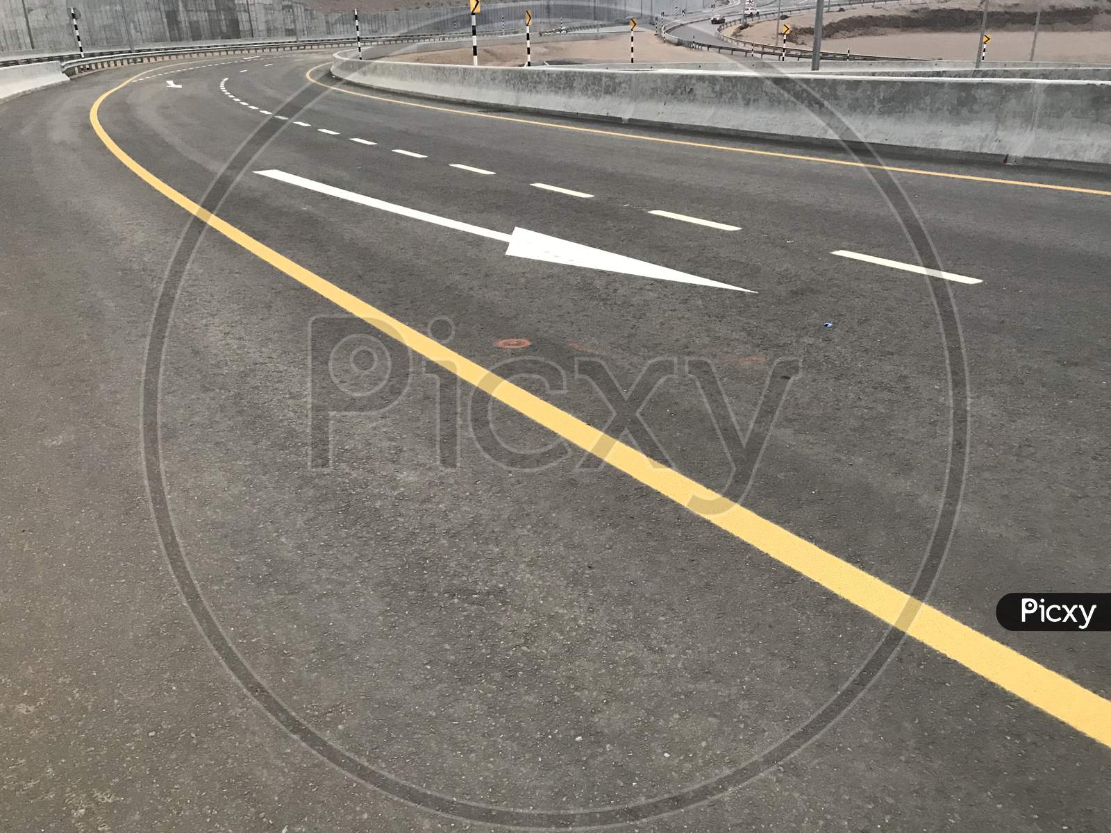 Image Of Tarmac Road Constructed In National Highways With International Standard Marks And Symbols For Both Sides Transport