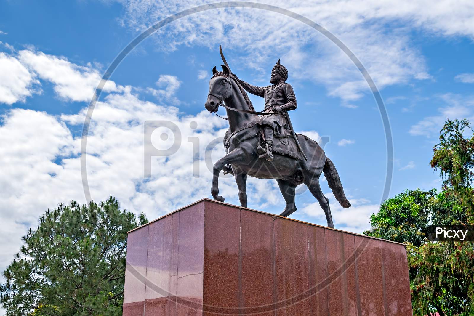Jammu,India-April18Th,2019:Beautifully Sculptured Horse Riding Statue Of Maharaja Gulab Singh(1792-1858)- The Founder Of Jammu & Kashmir State With Nice Blue Clouds In Background Sky.