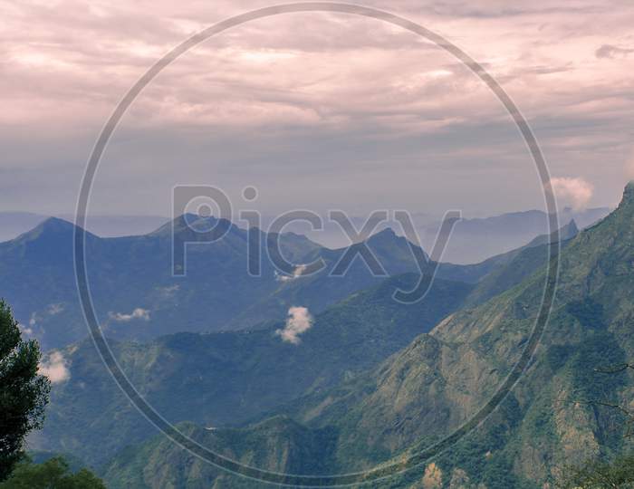 scenic panoramic mountain landscape and cloudy sky