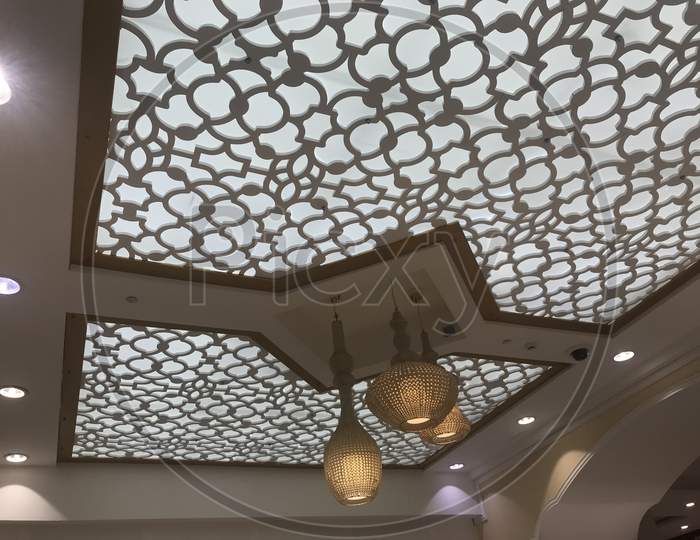 Suspended Gypsum False Ceiling Design With Beautiful Chandelier