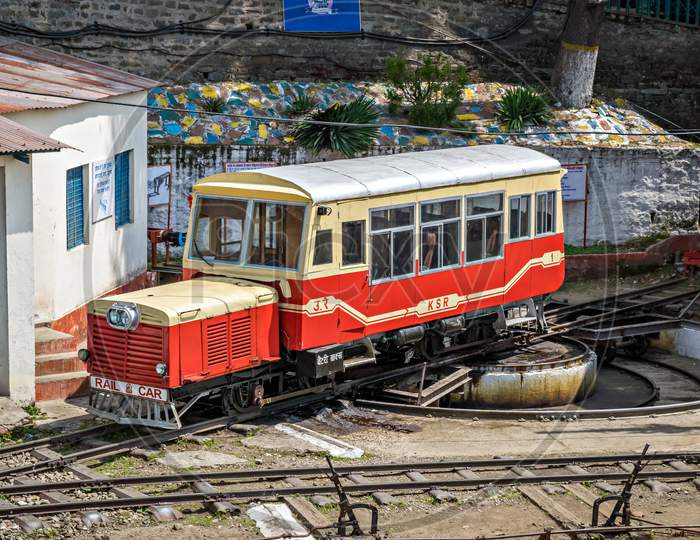 Shimla, Himachal Pradesh, India- April 15Th, 2015: Narrow Gauge, Self Propelled, Rail Car Resting On A Turn Table After Its Uphill
