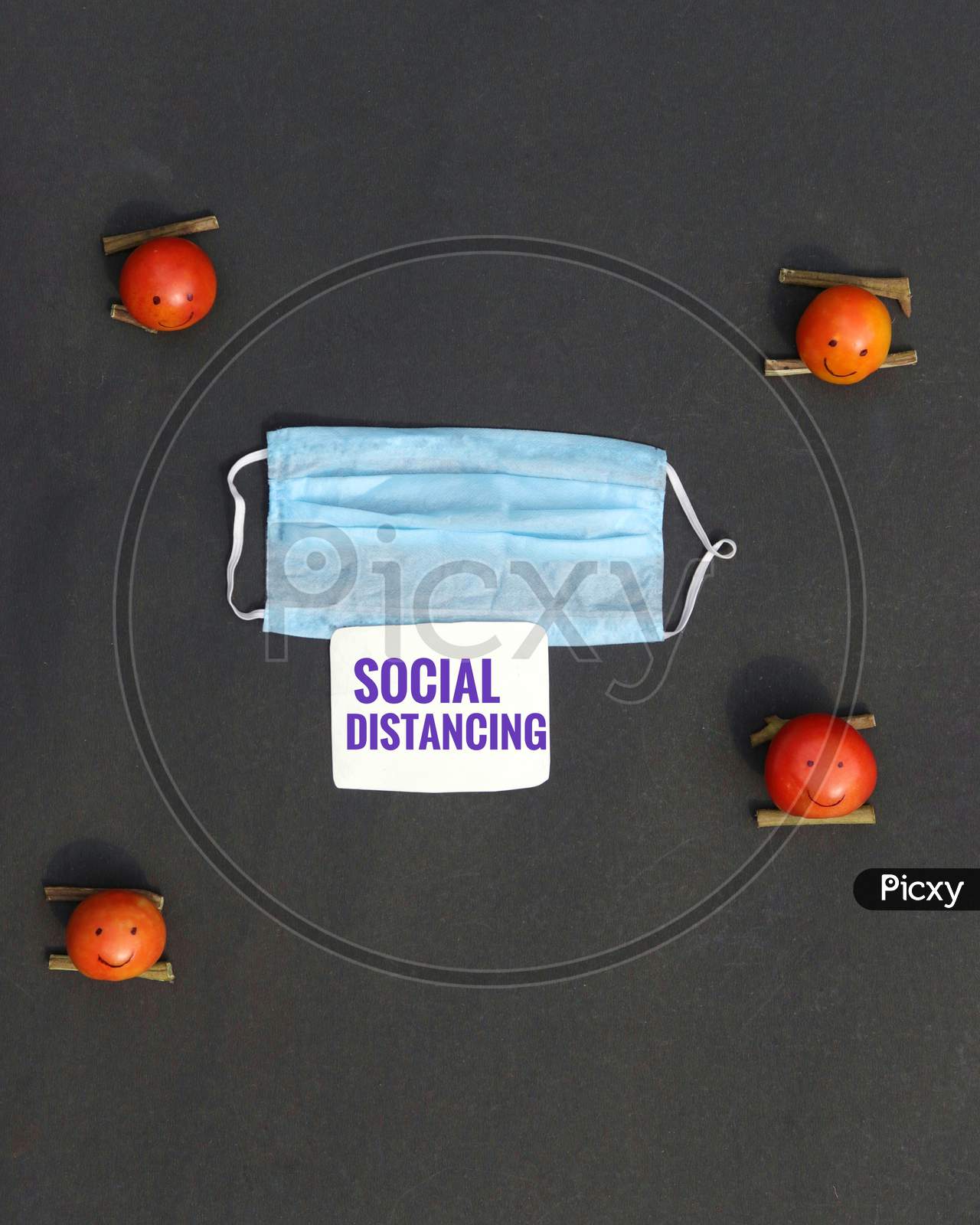Social Distancing or Safe Distance Due to Coronavirus Conceptual Photo with Medical Face Mask and Tomato Made CharactersSocial Distancing or Safe Distance Due to Coronavirus Conceptual Photo with Medical Face Mask and Tomato Made Characters