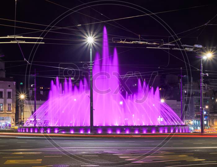 Illuminated Water Fountain At Slavija Square Roundabout In Belgrade Serbia