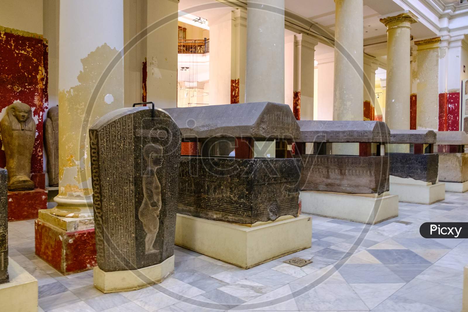 Image of Ancient Egyptian Sarcophagi And Mummy Caskets Displayed In ...