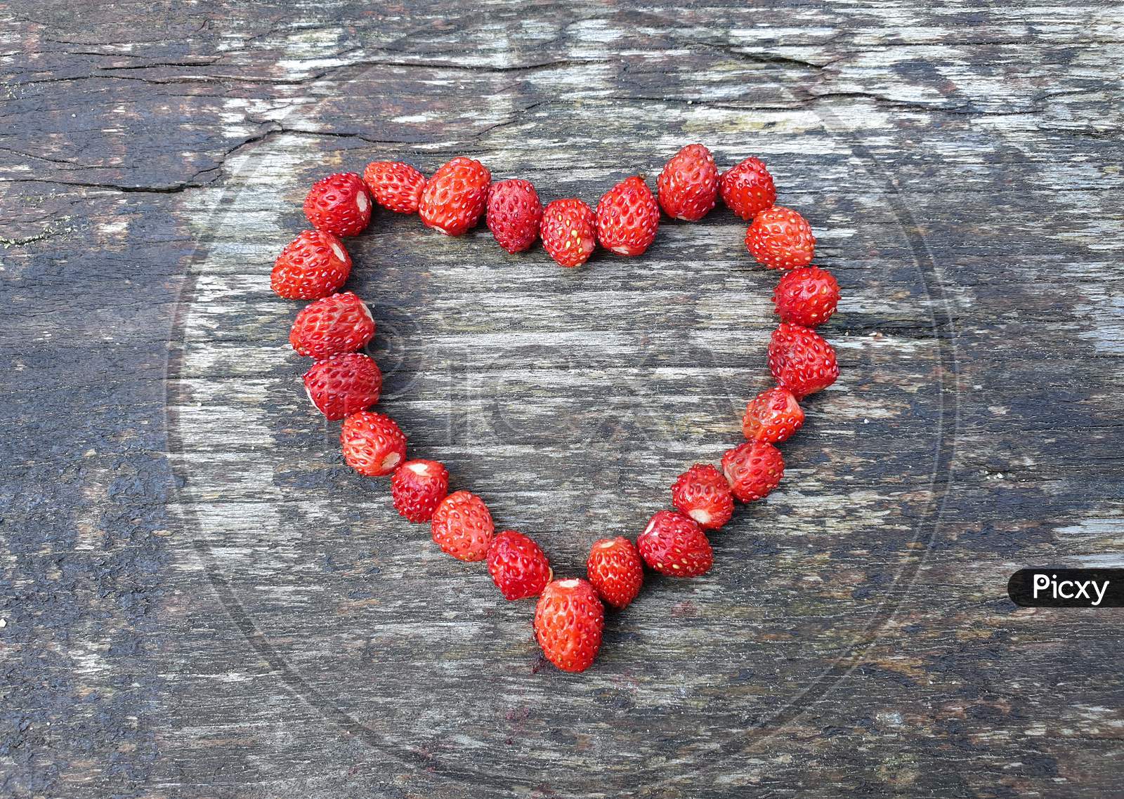 Image Of Fresh Wild Strawberries In Shape Of Heart On Wood NE Picxy