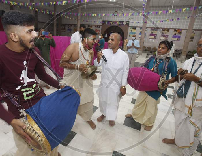 Devotees sing devotional songs  during Janmashtami celebrations at ISKCON (The International Society for Krishna Consciousness) temple in Chandigarh August 12, 2020