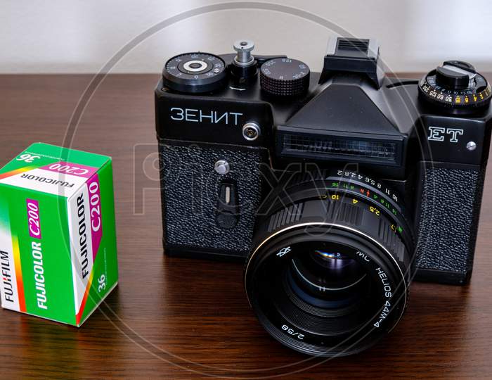 Soviet Analog Film Camera Zenit Et, With A Pack Of Fujifilm Fujicolor C200 Film