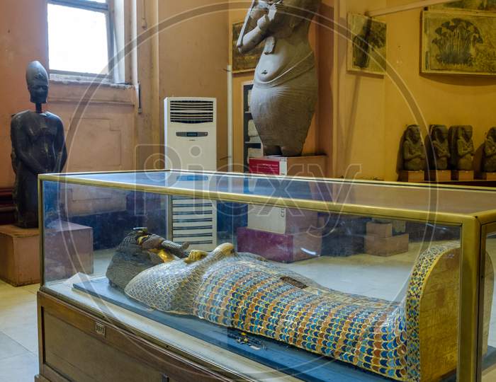 Ancient Egyptian Sarcophagi And Mummy Caskets Displayed In Egyptian Museum In Cairo, Capital Of Egypt
