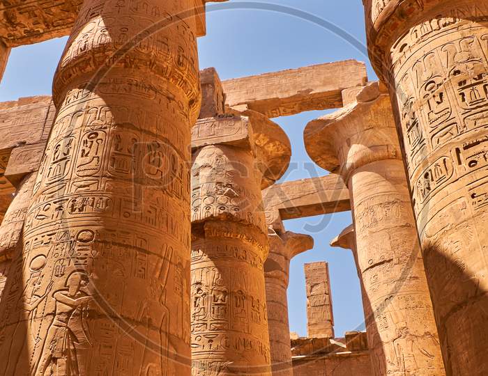 Massive Pillars Of The Great Hypostyle Hall In The Karnak Temple In Luxor, Egypt