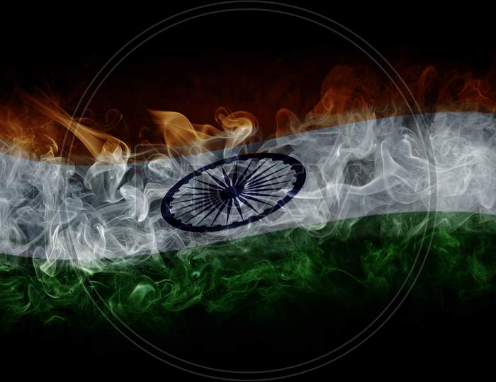 Indian Flag With Smoke Isolated On Black Background
